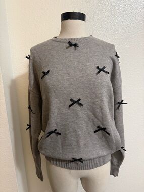 Edikted Gray Knit Sweater with Black Bow Details and Pink Tag